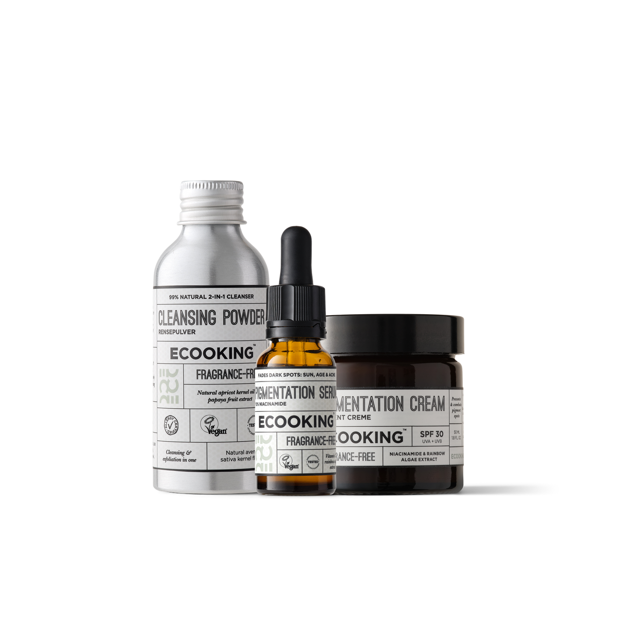 Cleansing Powder, Pigmentation Serum og Pigmentation Cream SPF 30 fra ECOOKING stillet op side om side mod en lys baggrund.